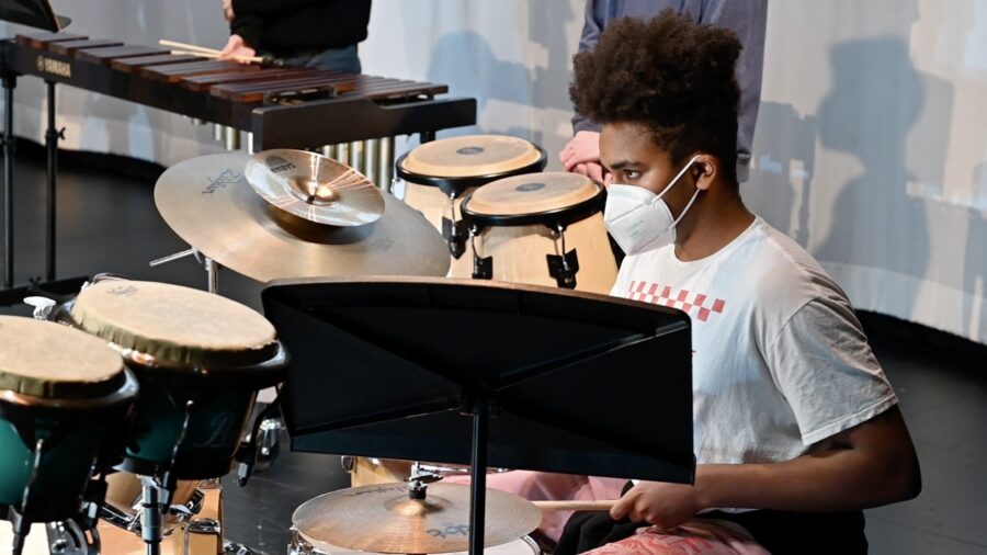 Student playing percusion