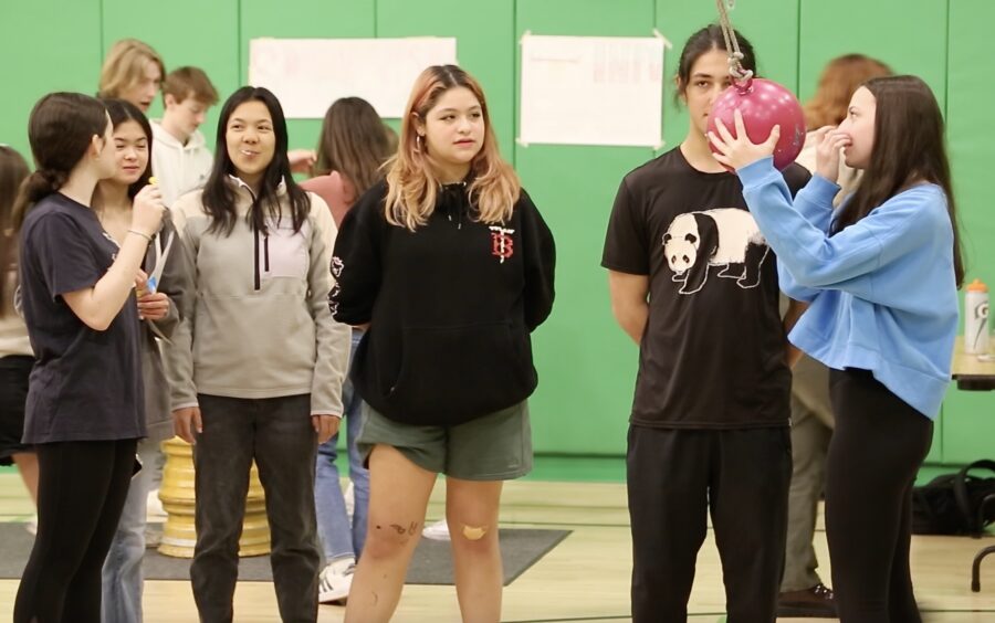 Students with a bowling ball