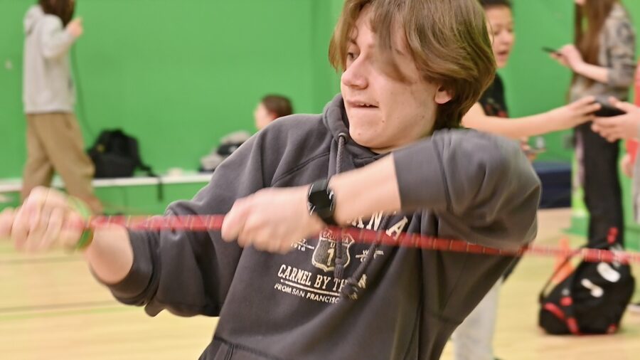 Student tugging a rope