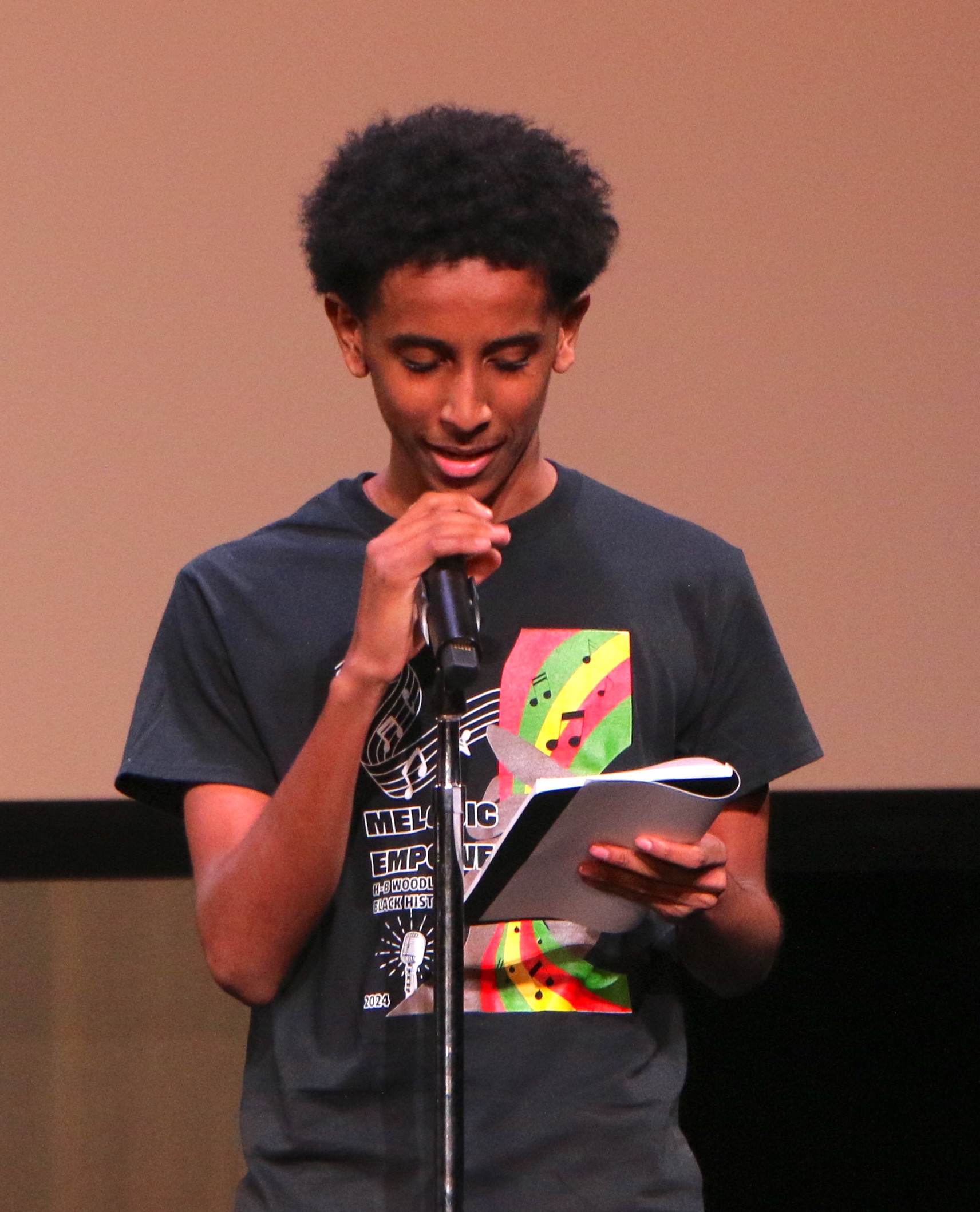 Student reading a poem