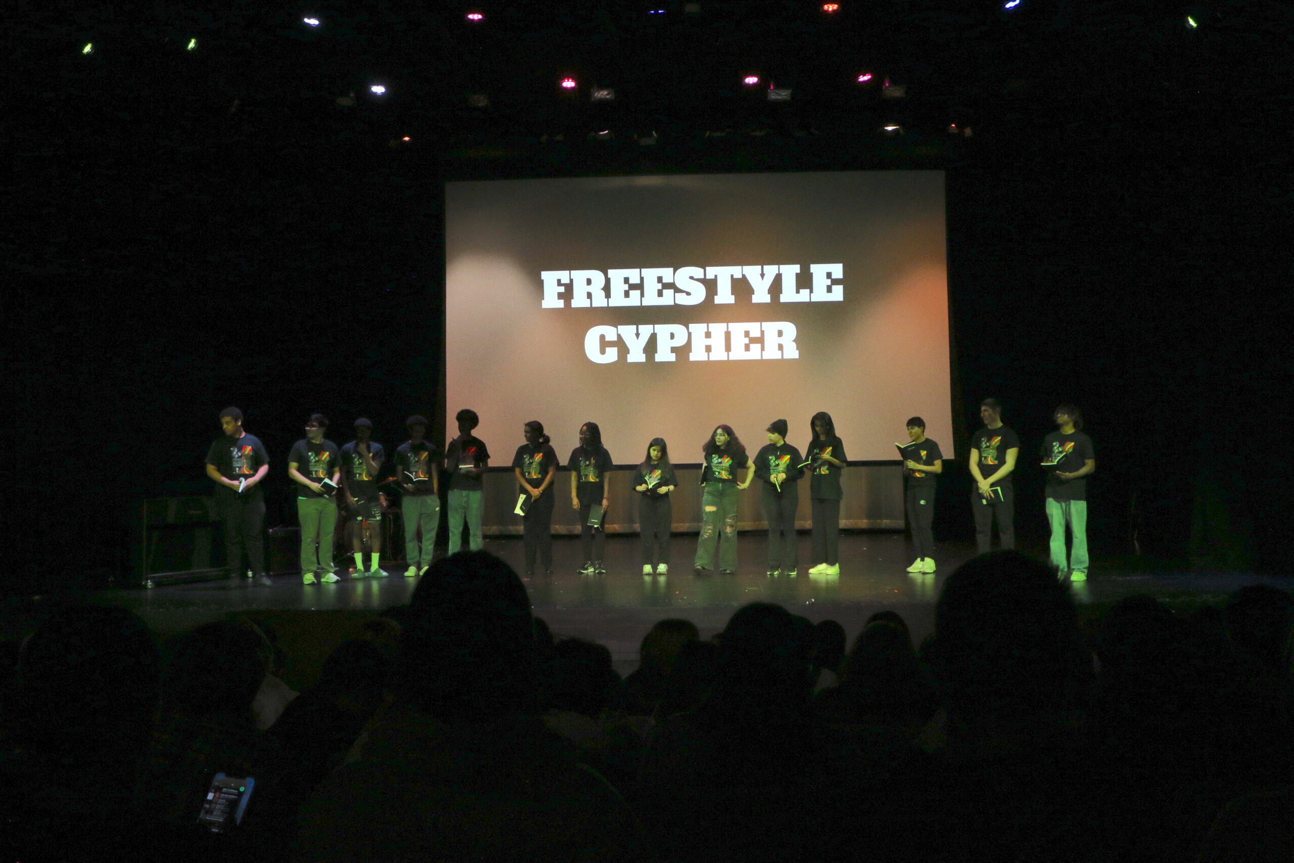 Student in front of Freestyle Cypher
