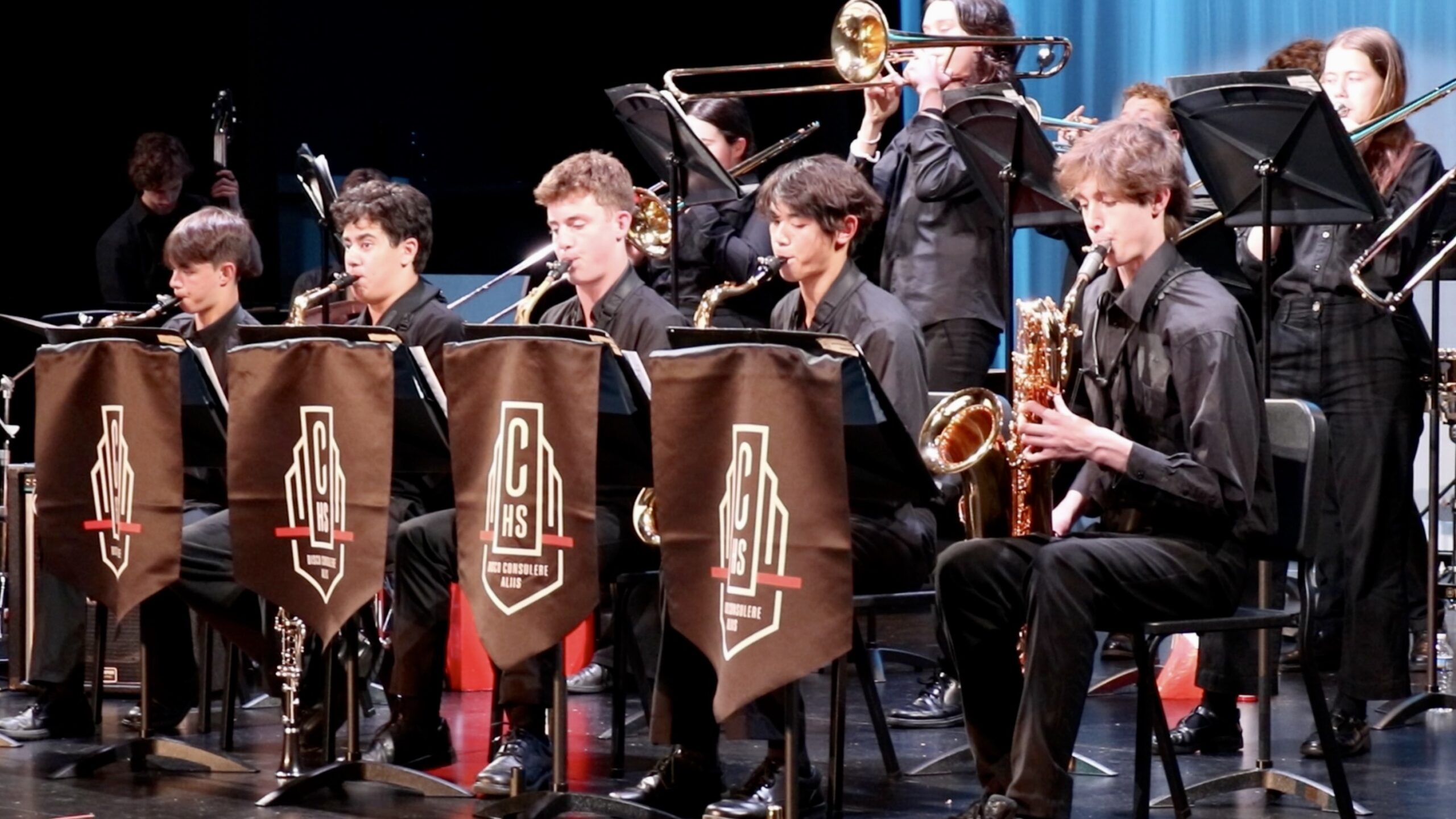 Students playing saxophones