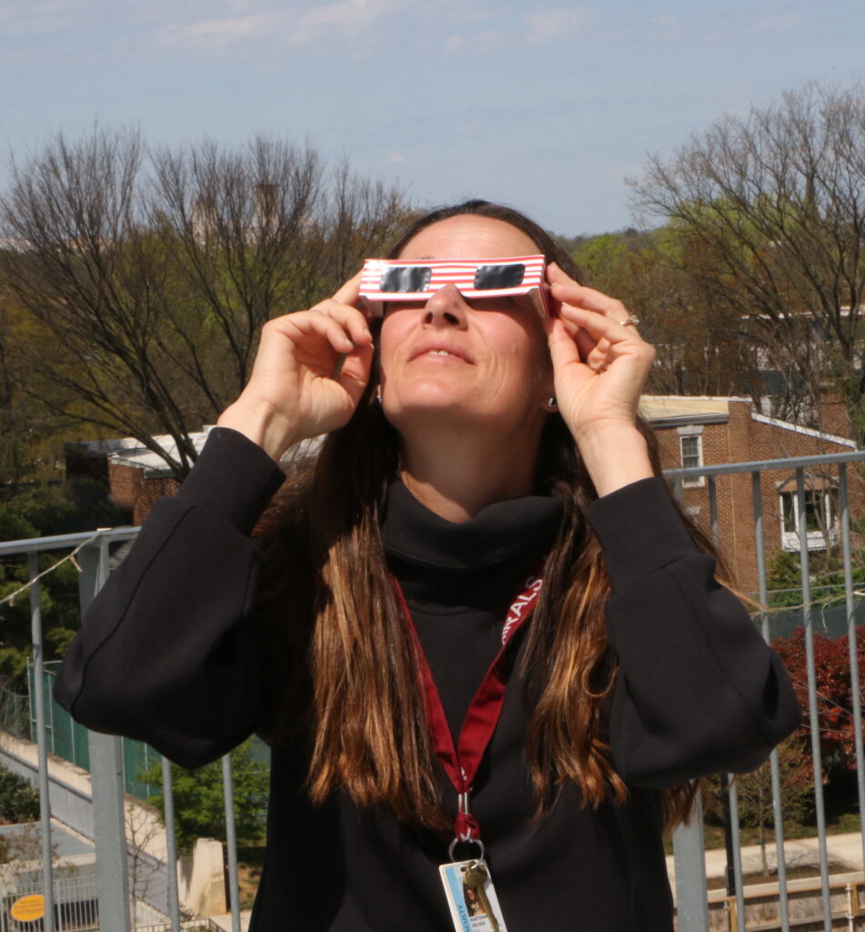 Teacher viewing eclipse