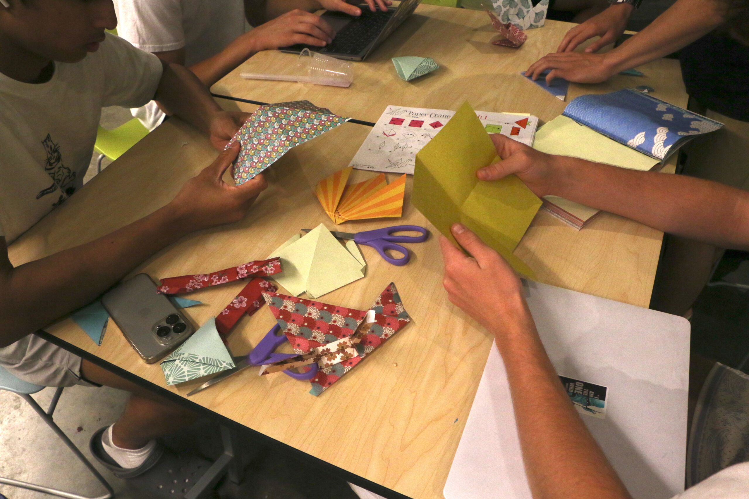 Picture of hands making origami