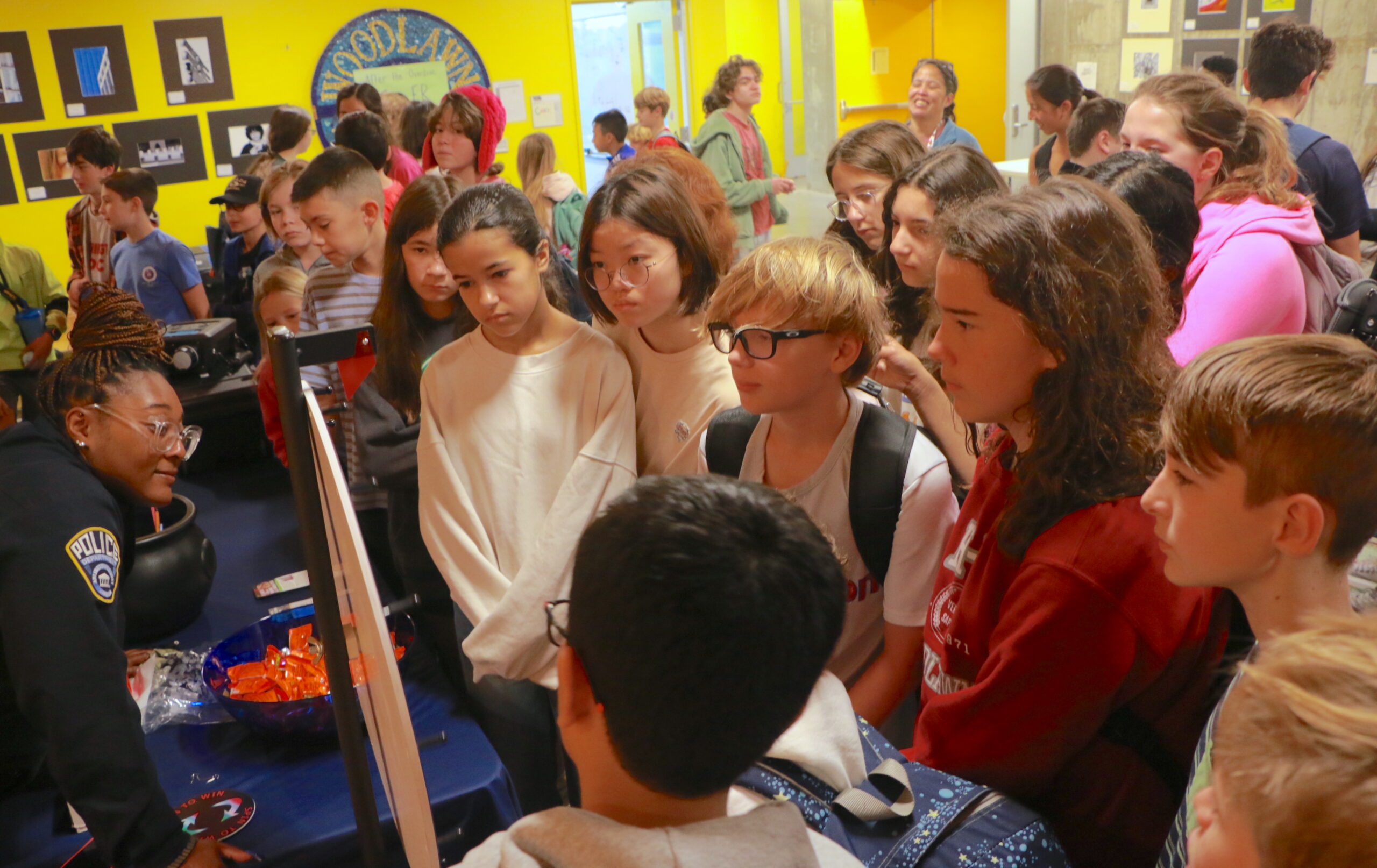 Students looking at a D.A.R.E. presentation