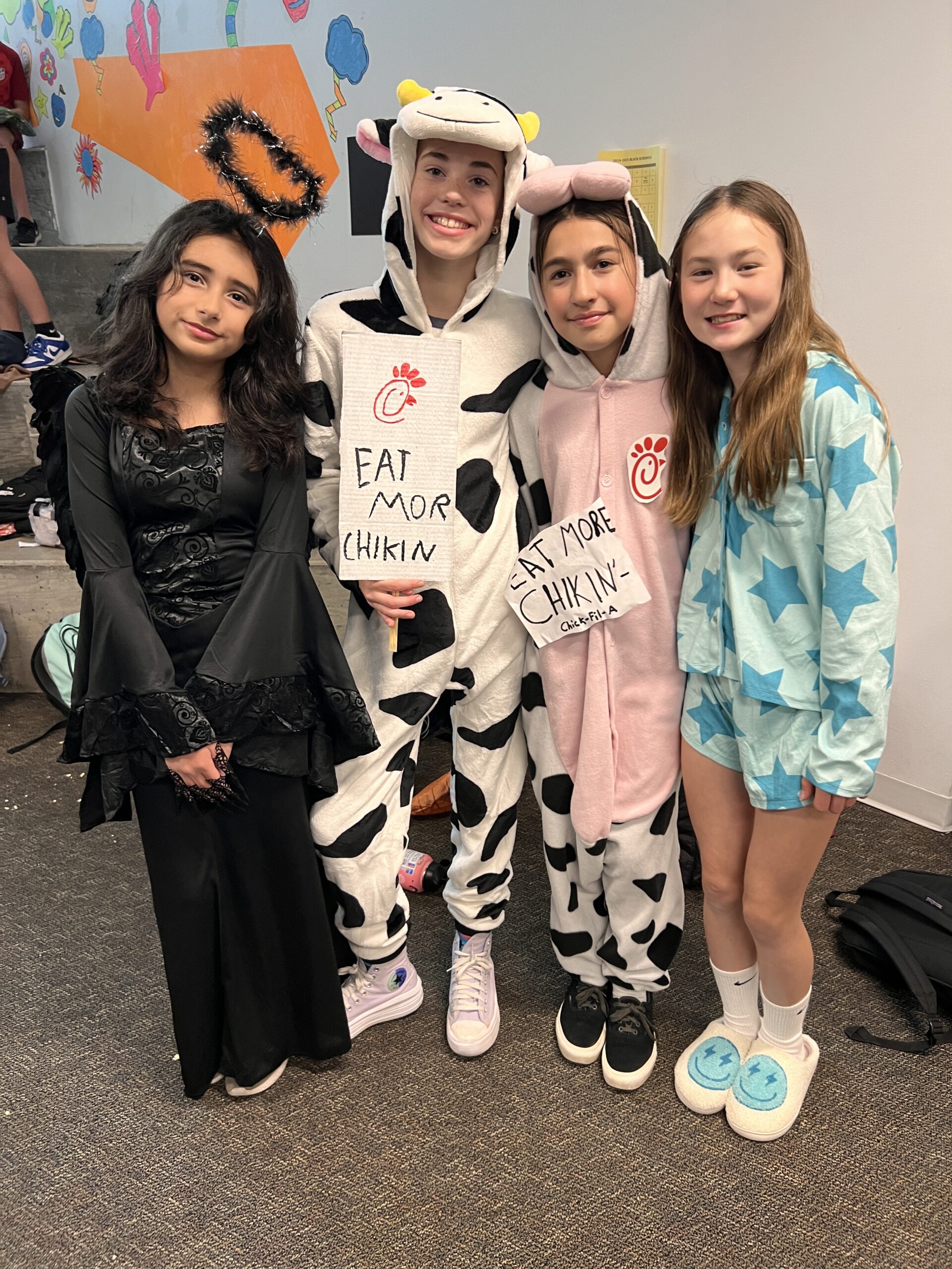 Four middle schoolers in costume