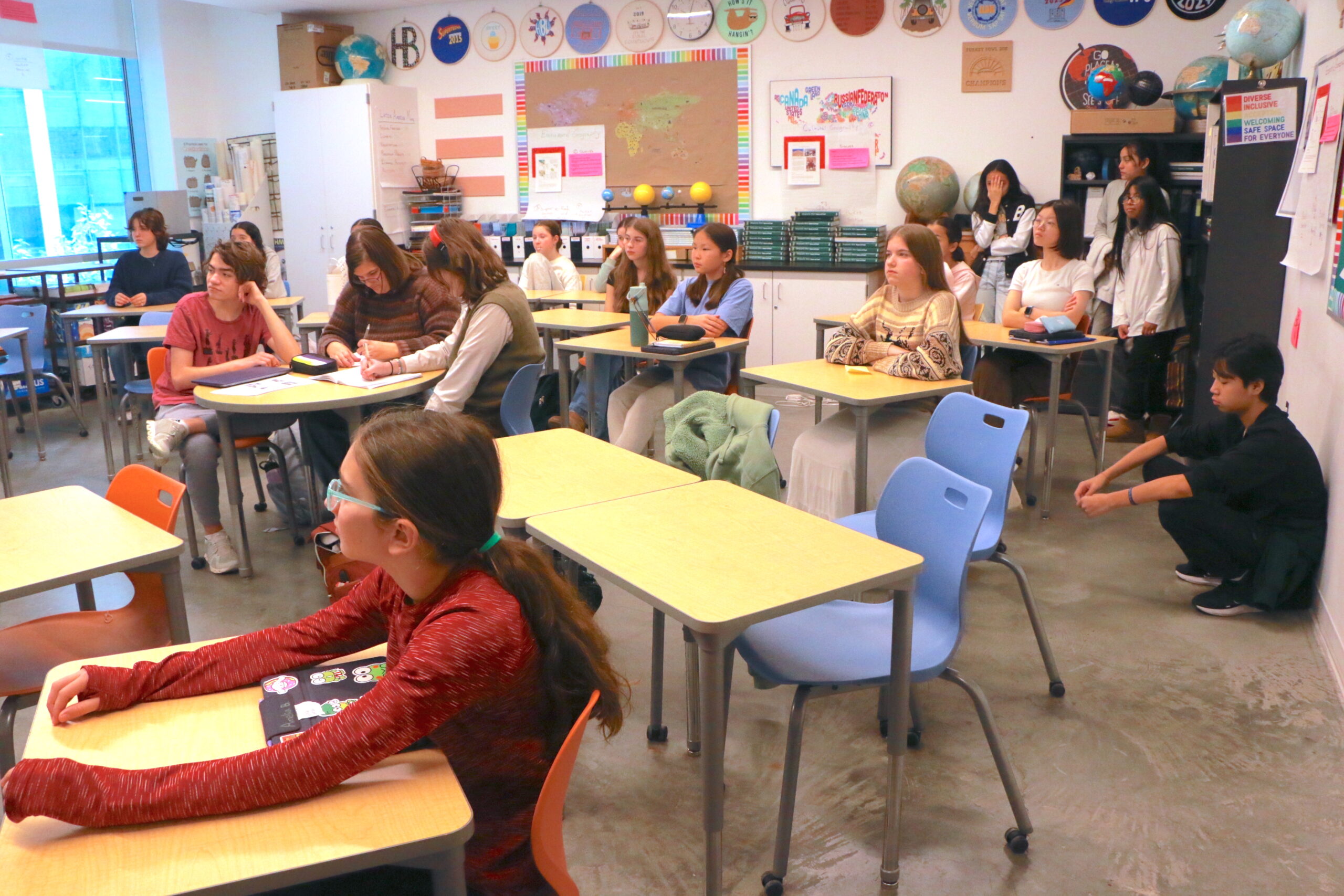 Students listing to career day presenter