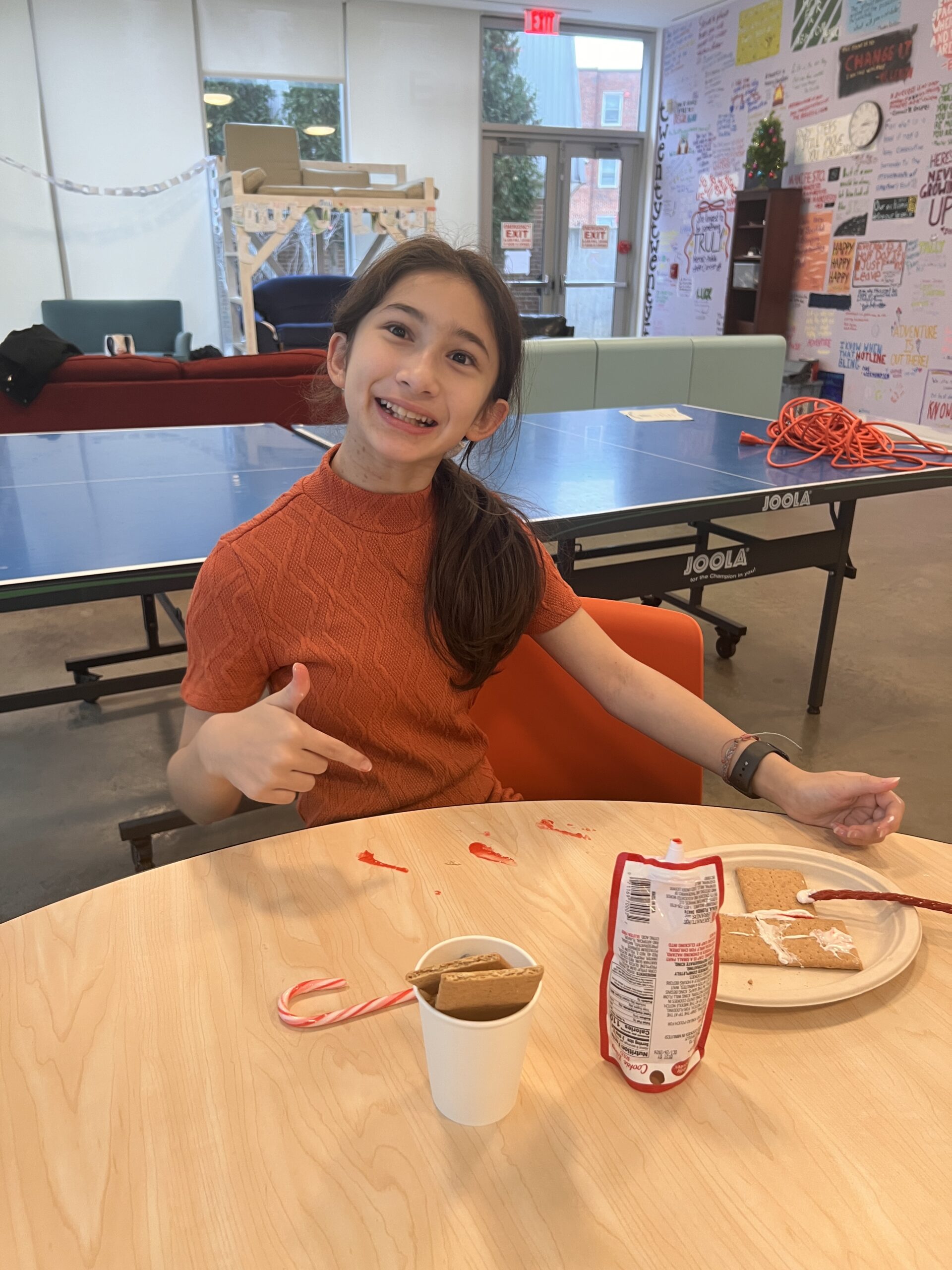 Students making gingerbread houses