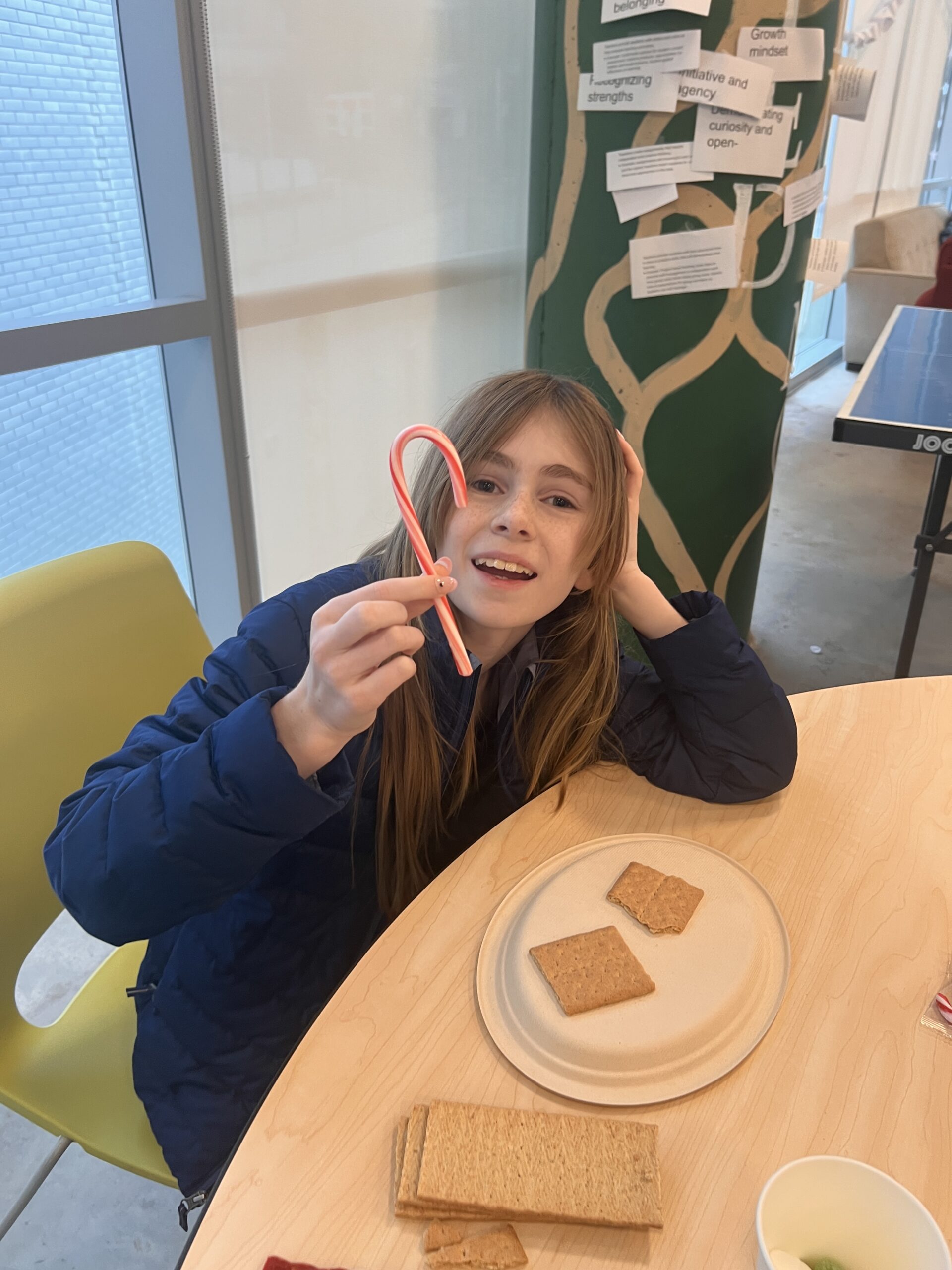 Students making gingerbread houses