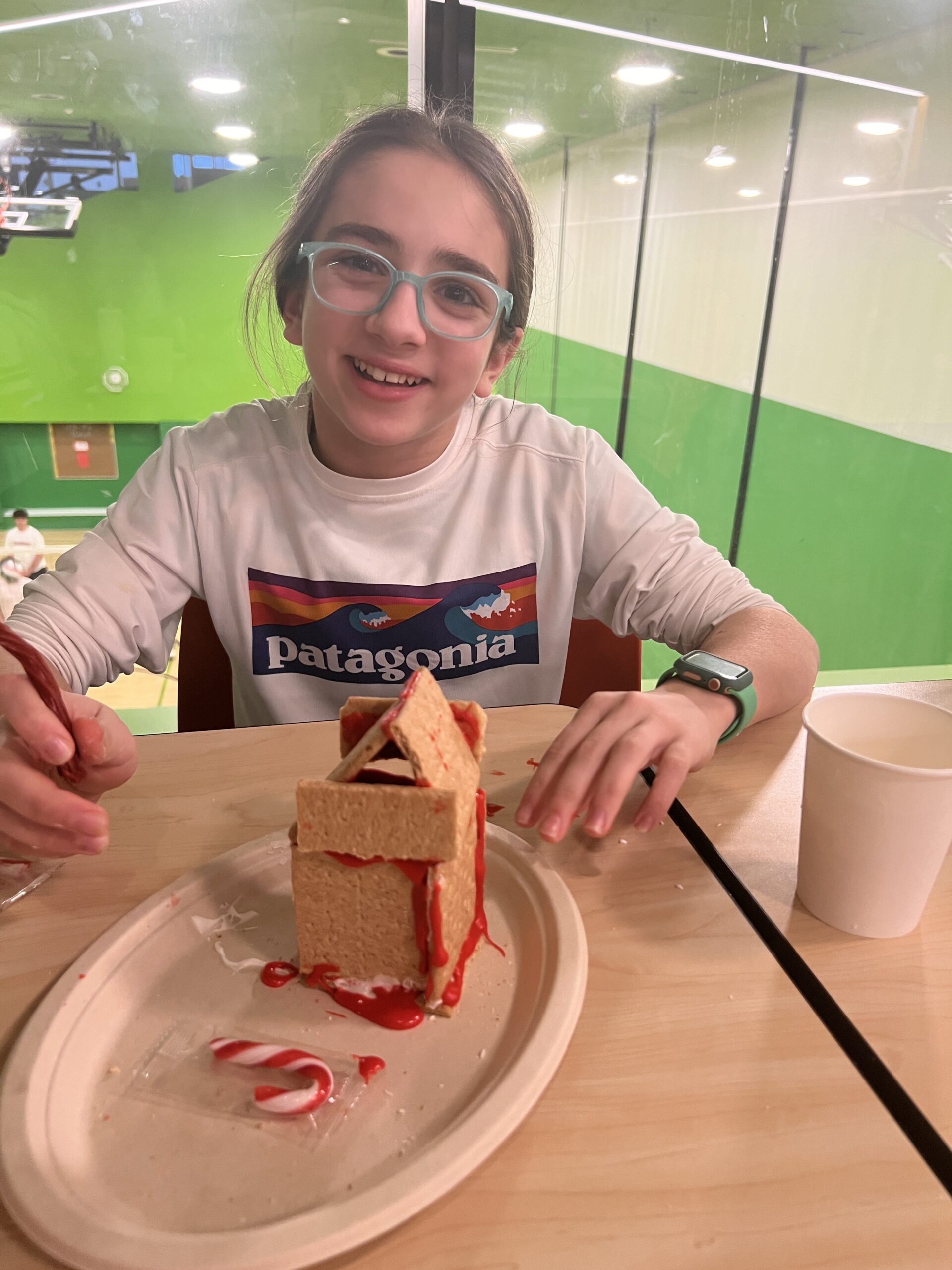 Students making gingerbread houses