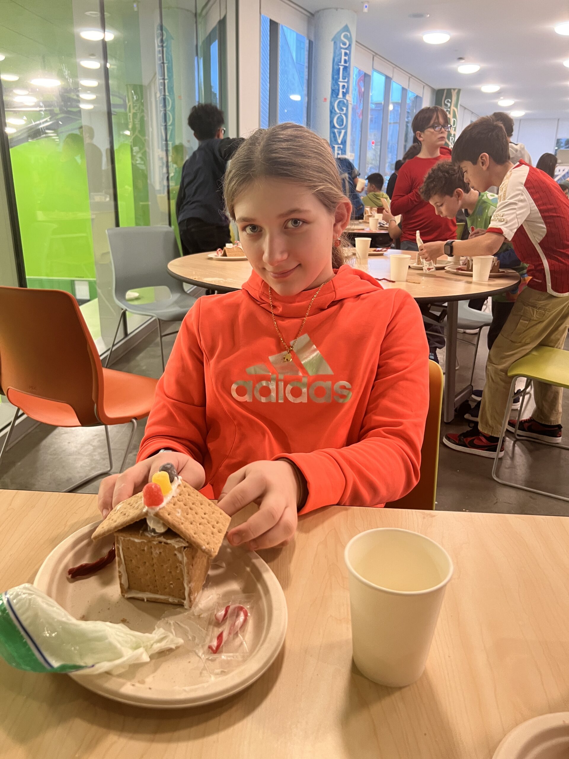 Students making gingerbread houses