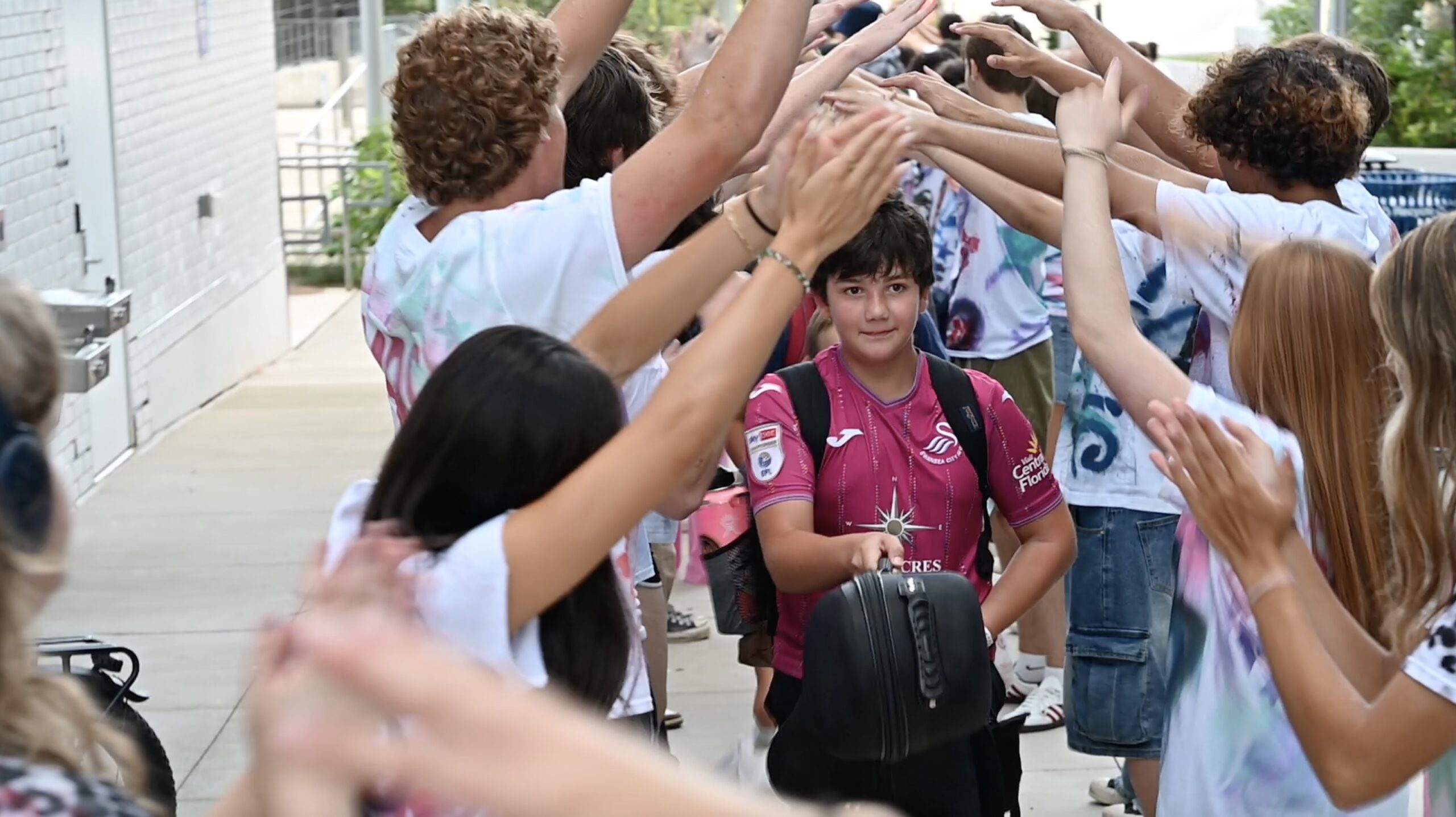 Students arriving to school on the first day