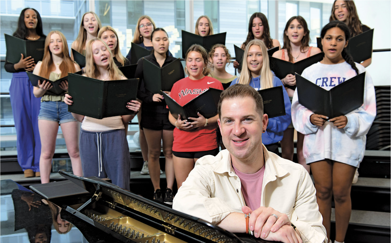 Choral director Bill Podolski with students at H-B Woodlawn