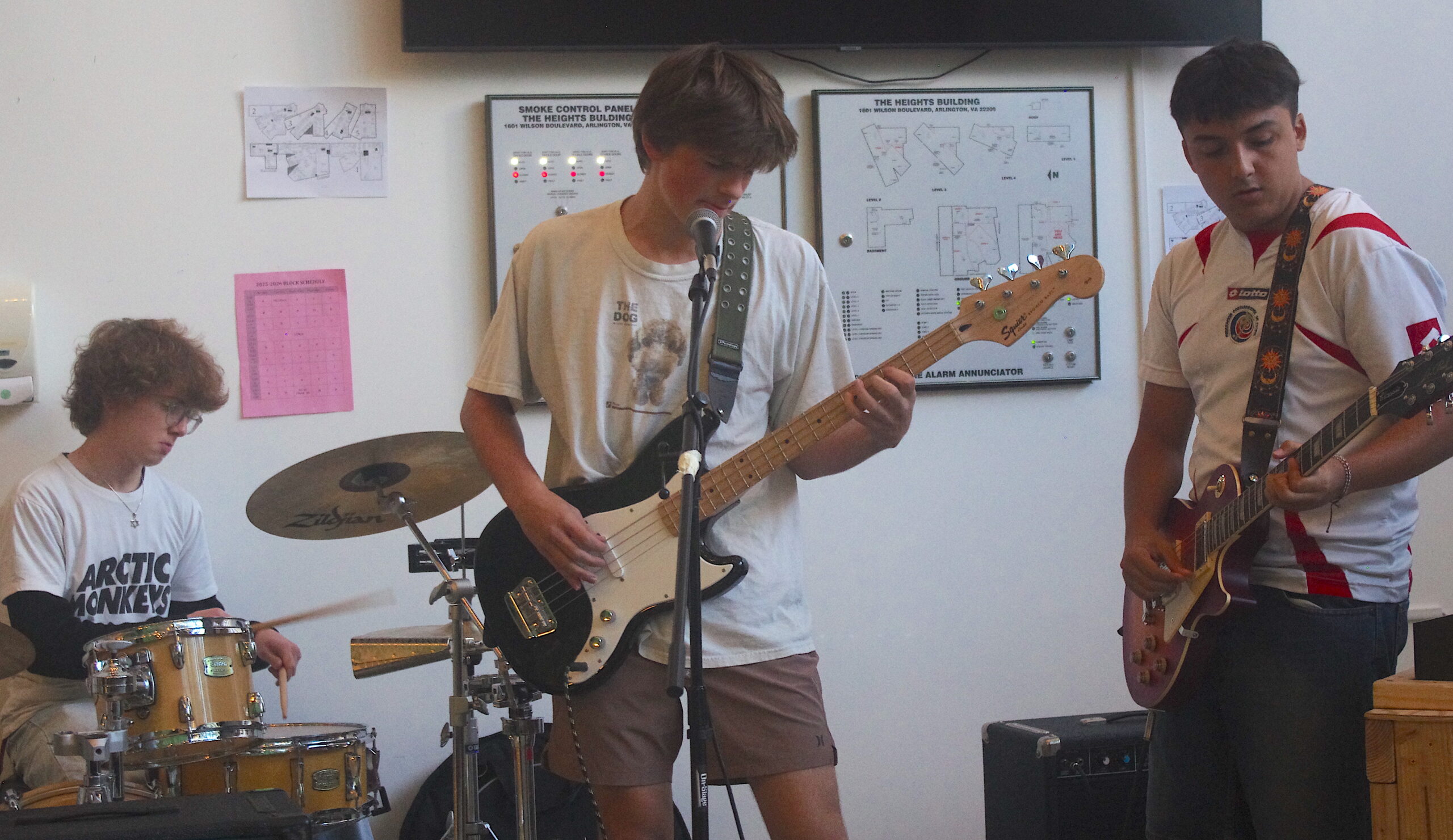 Student rocking out on a guitar at Hispanic Heritage Celebration