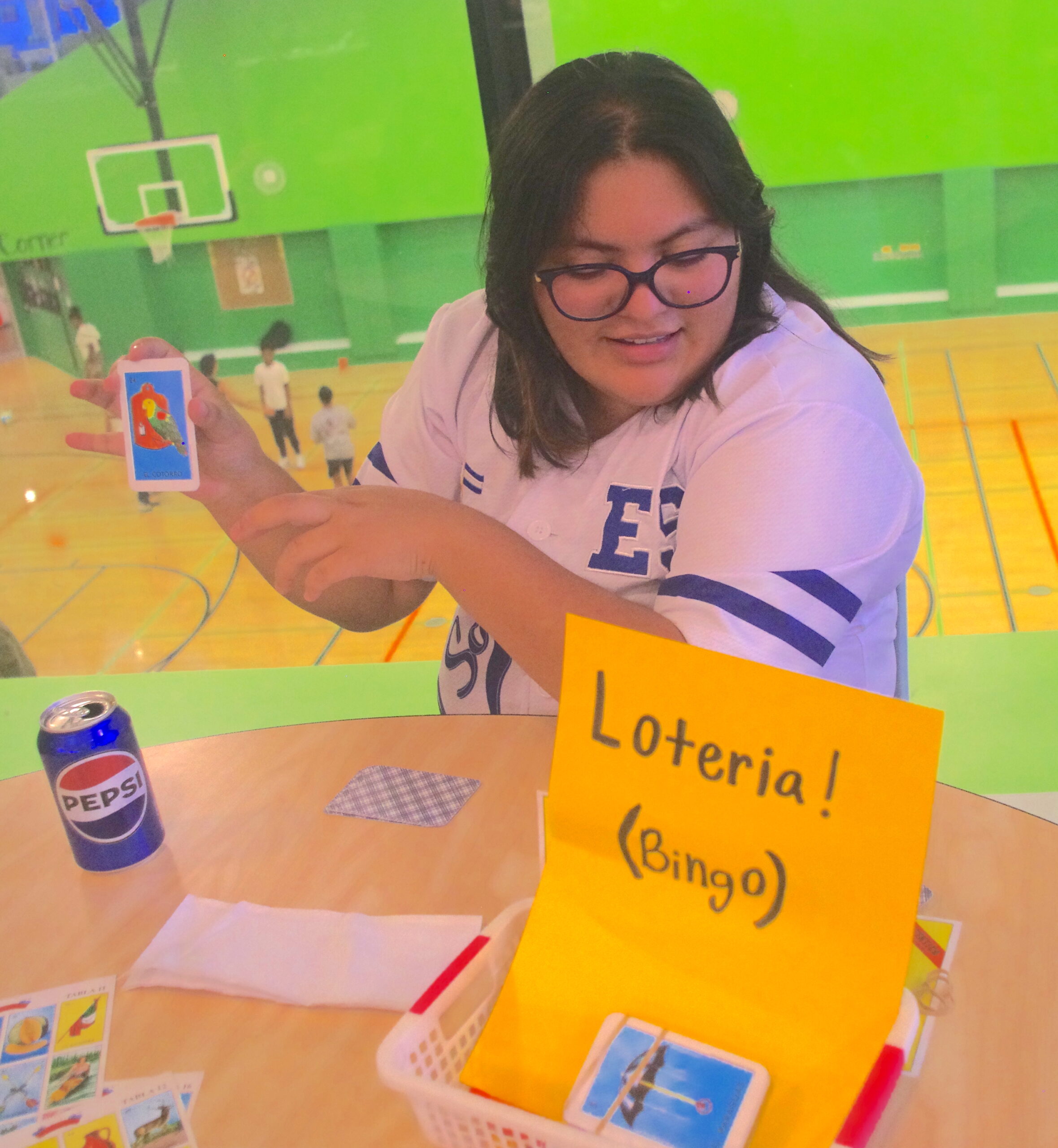 Student leading an activity at Hispanic Heritage Celebration