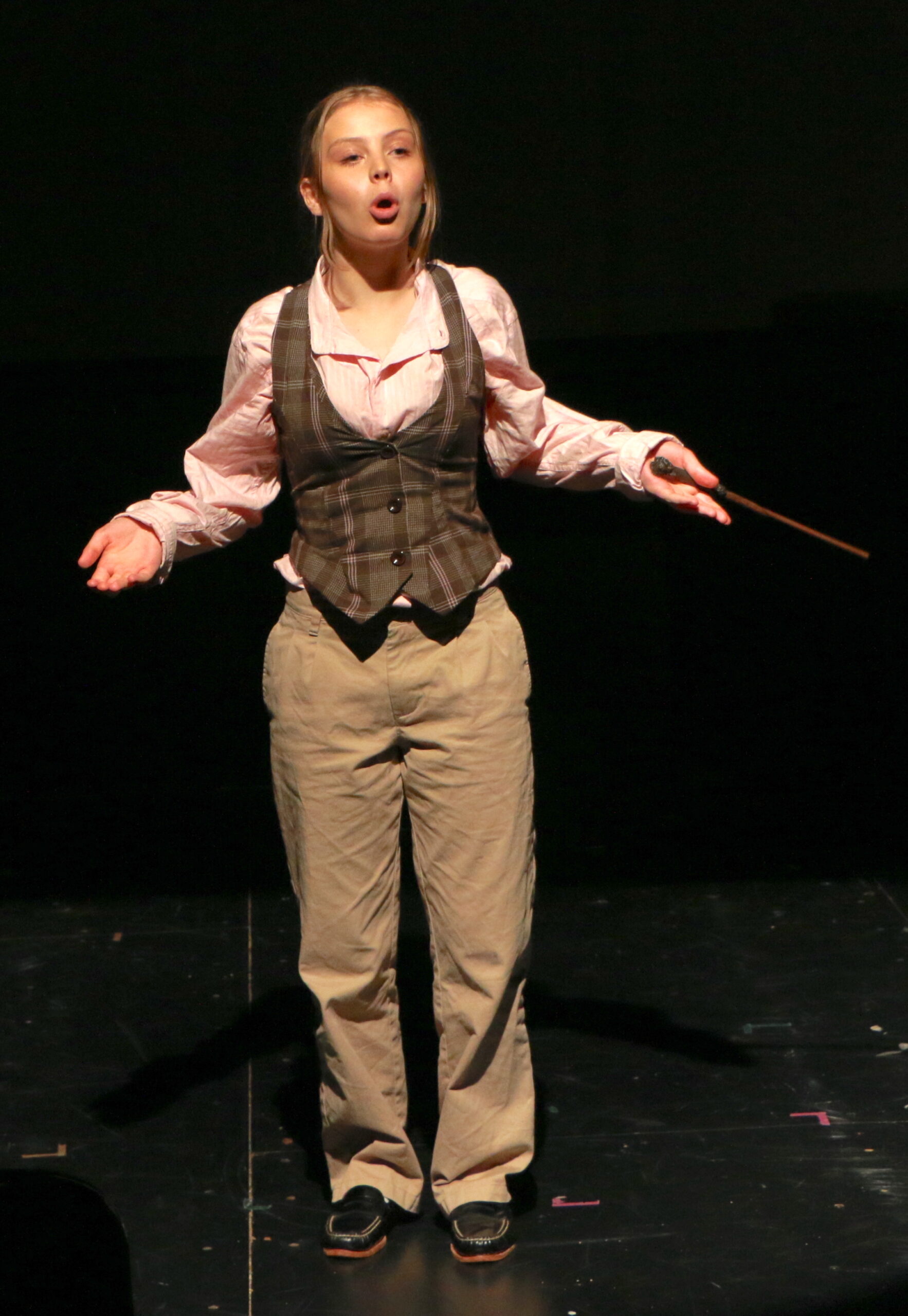 Student actors performing in Puffs