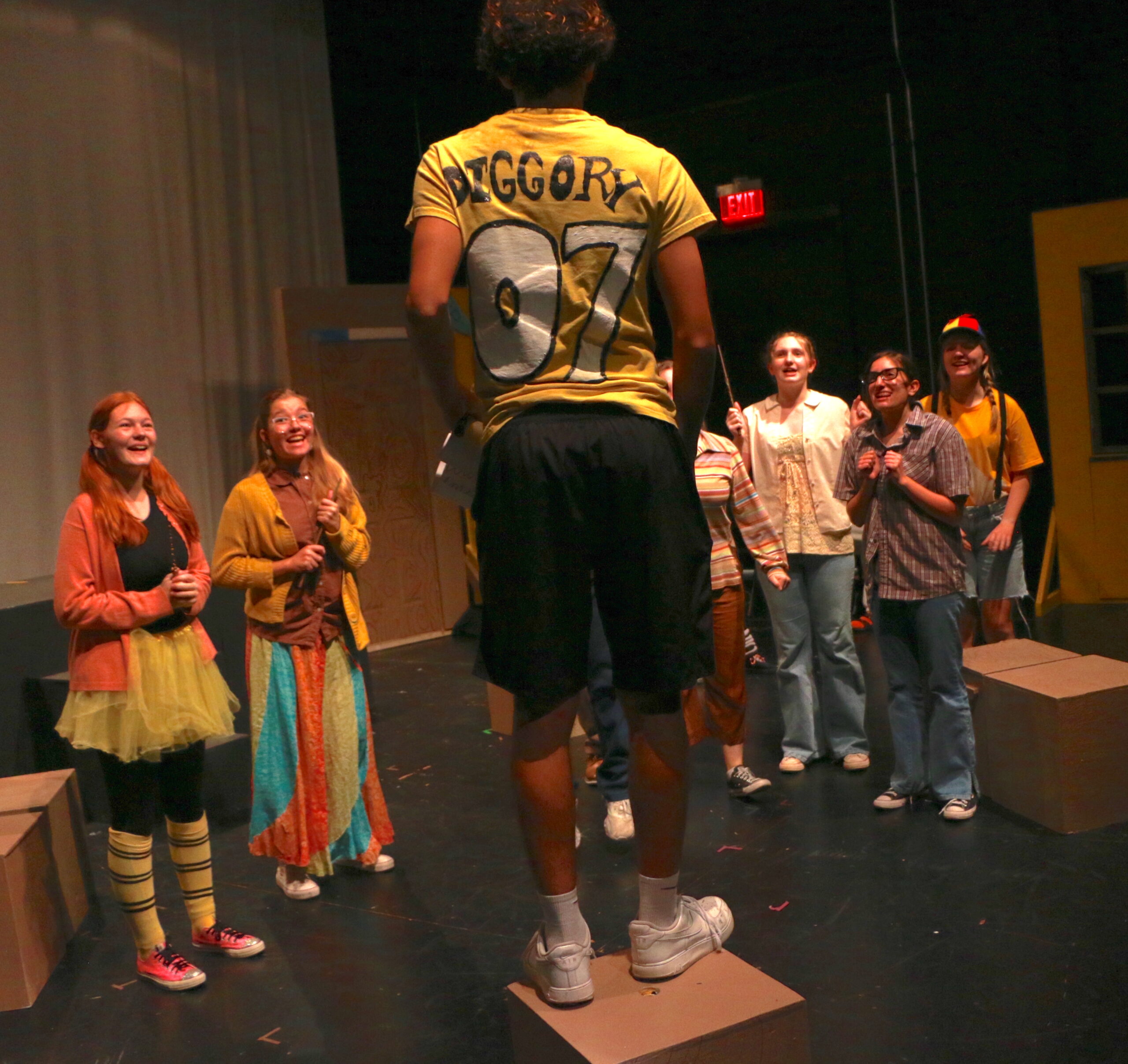 Student actors performing in Puffs