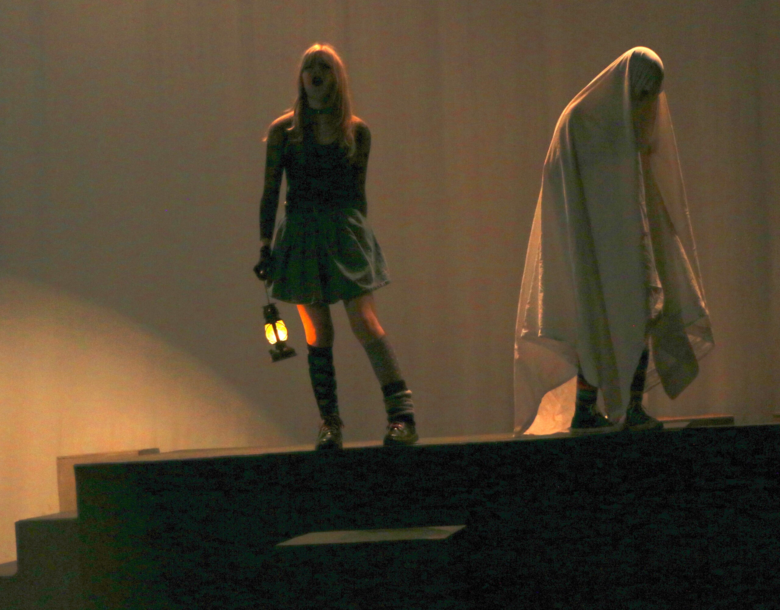 Student actors performing in Puffs