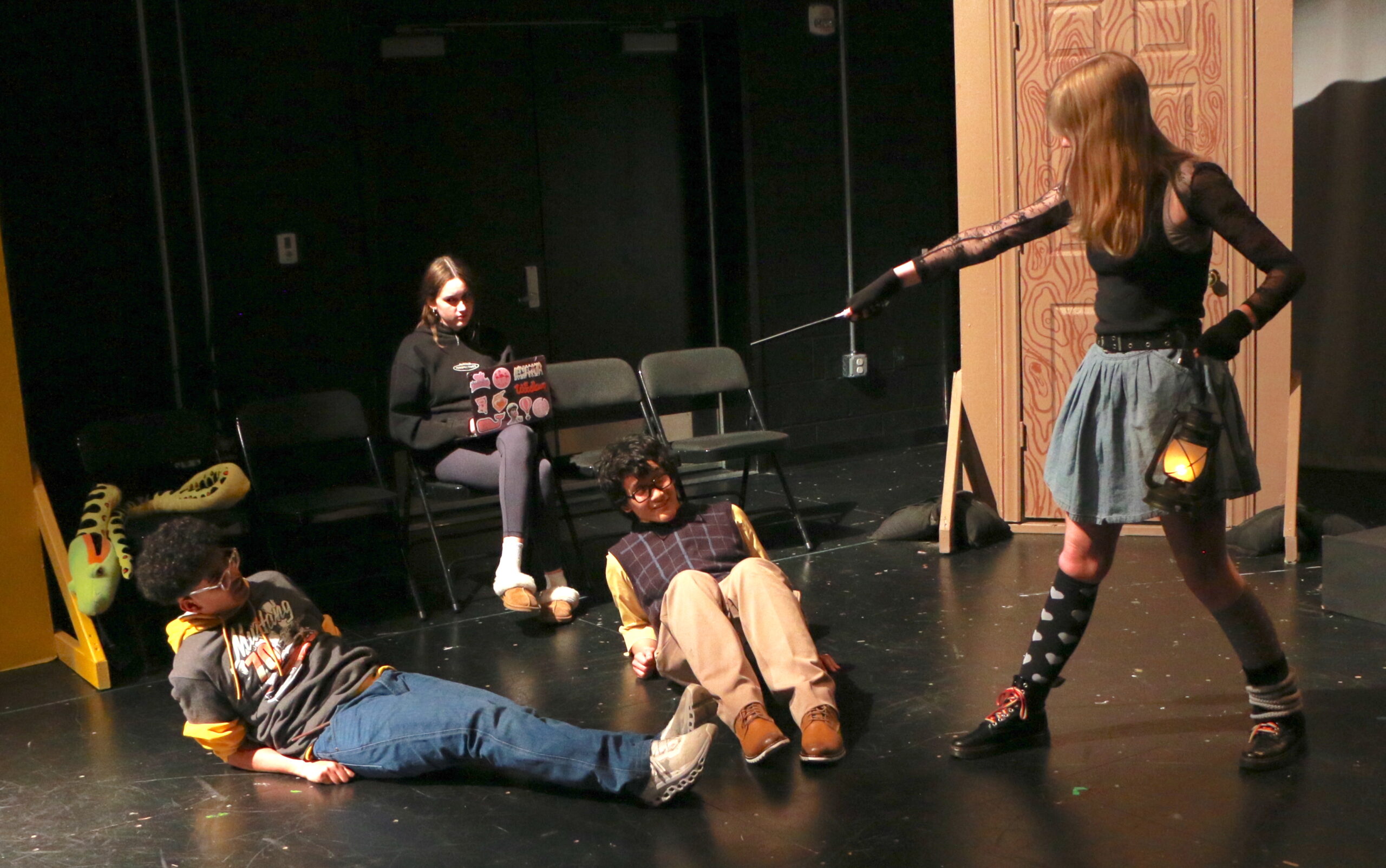 Student actors performing in Puffs