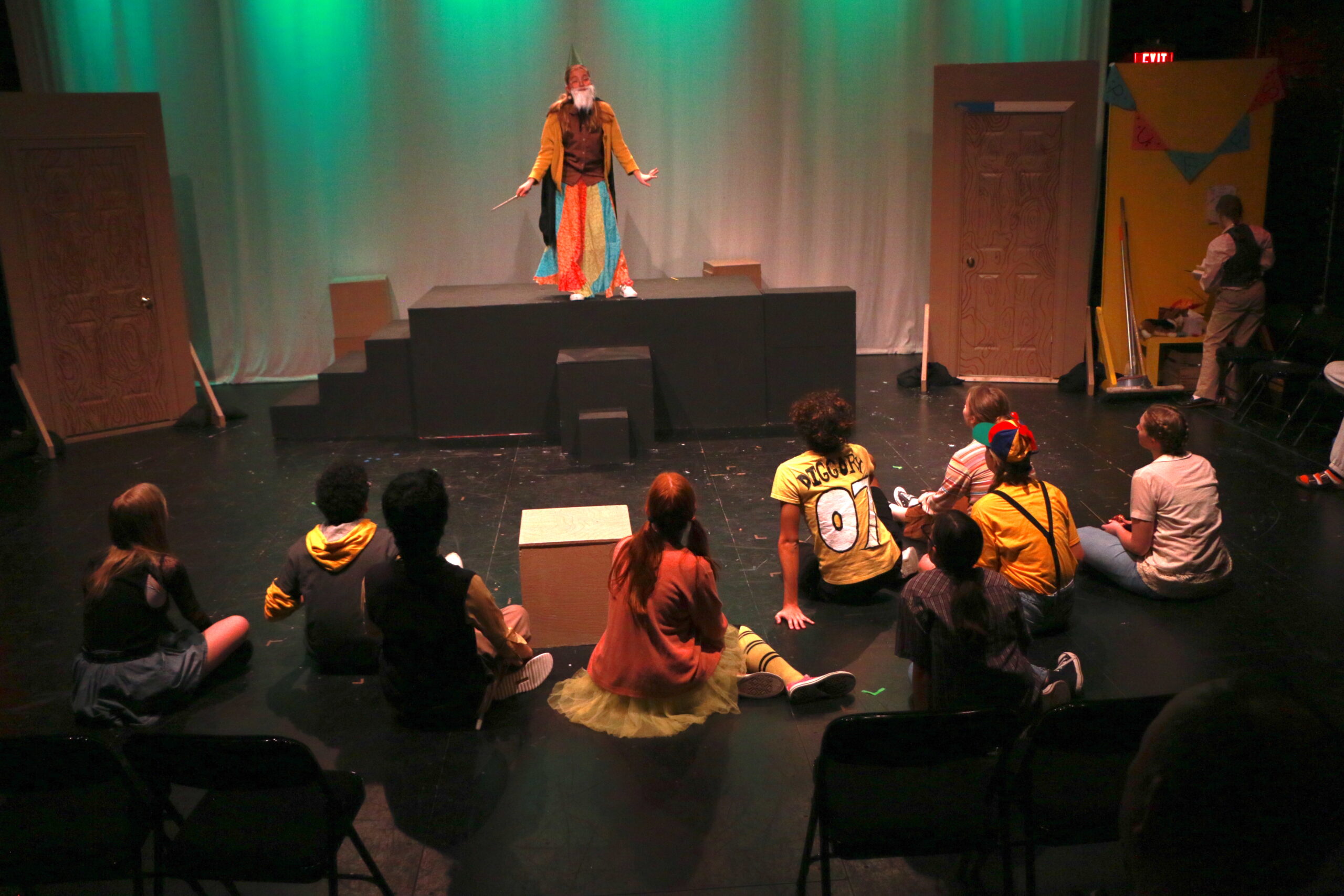 Student actors performing in Puffs