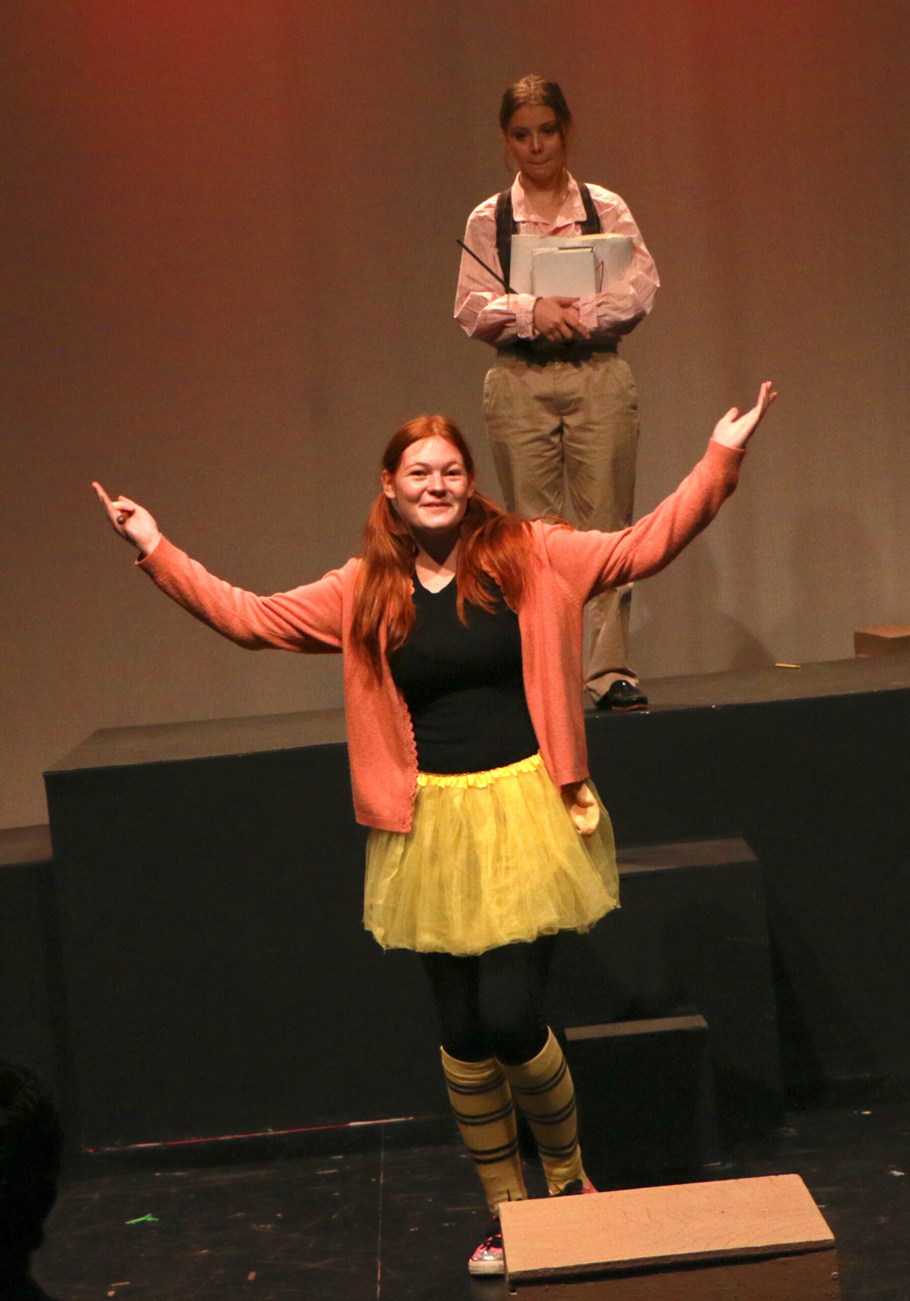 Student actors performing in Puffs