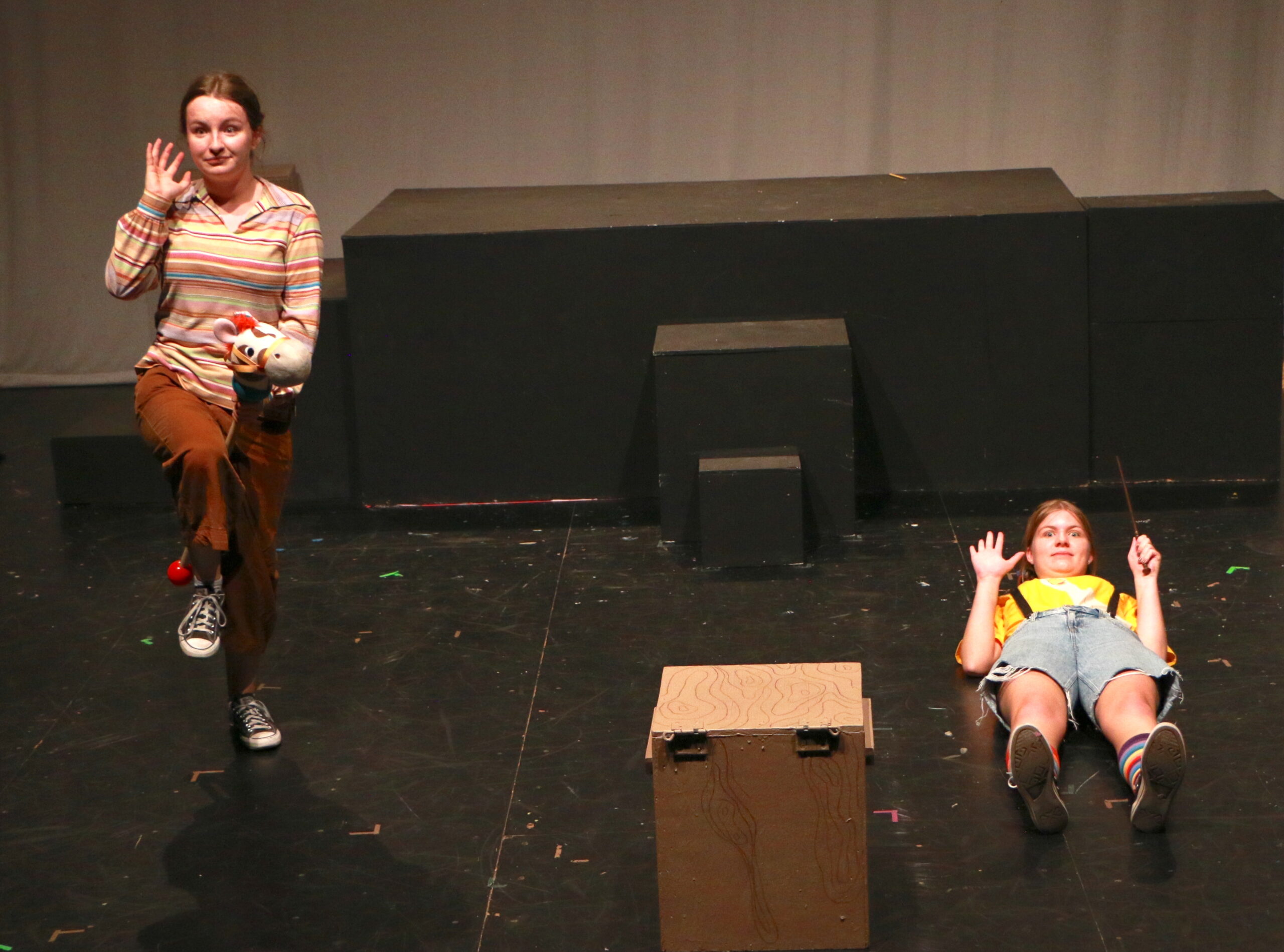 Student actors performing in Puffs