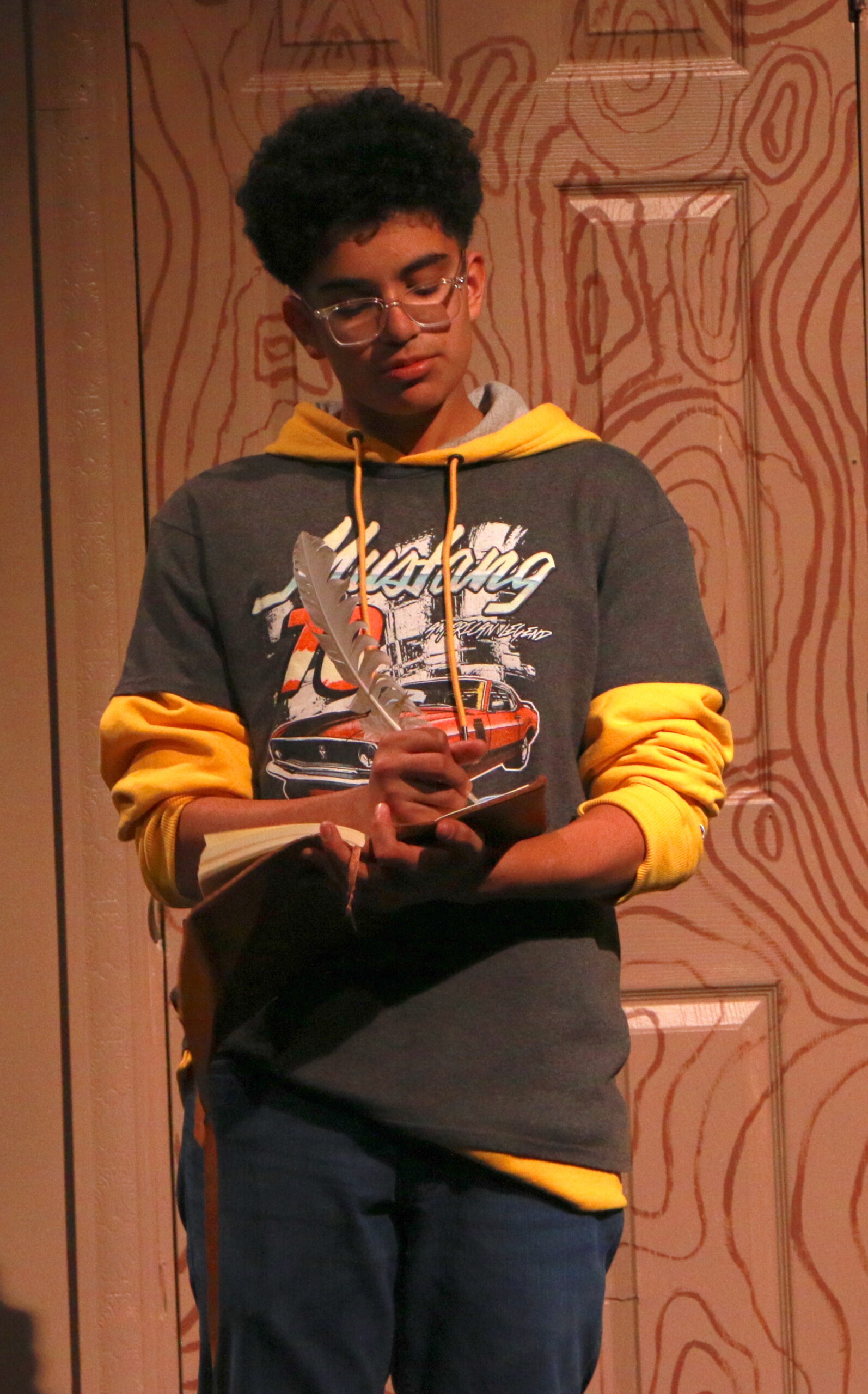 Student actor performing in Puffs