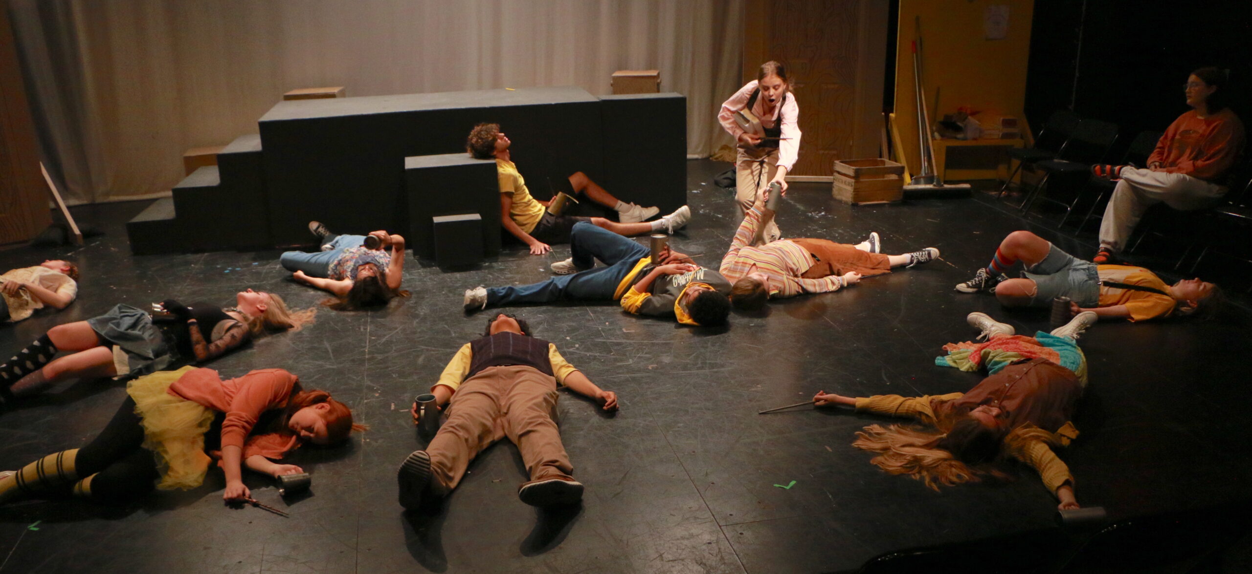 Student actors performing in Puffs