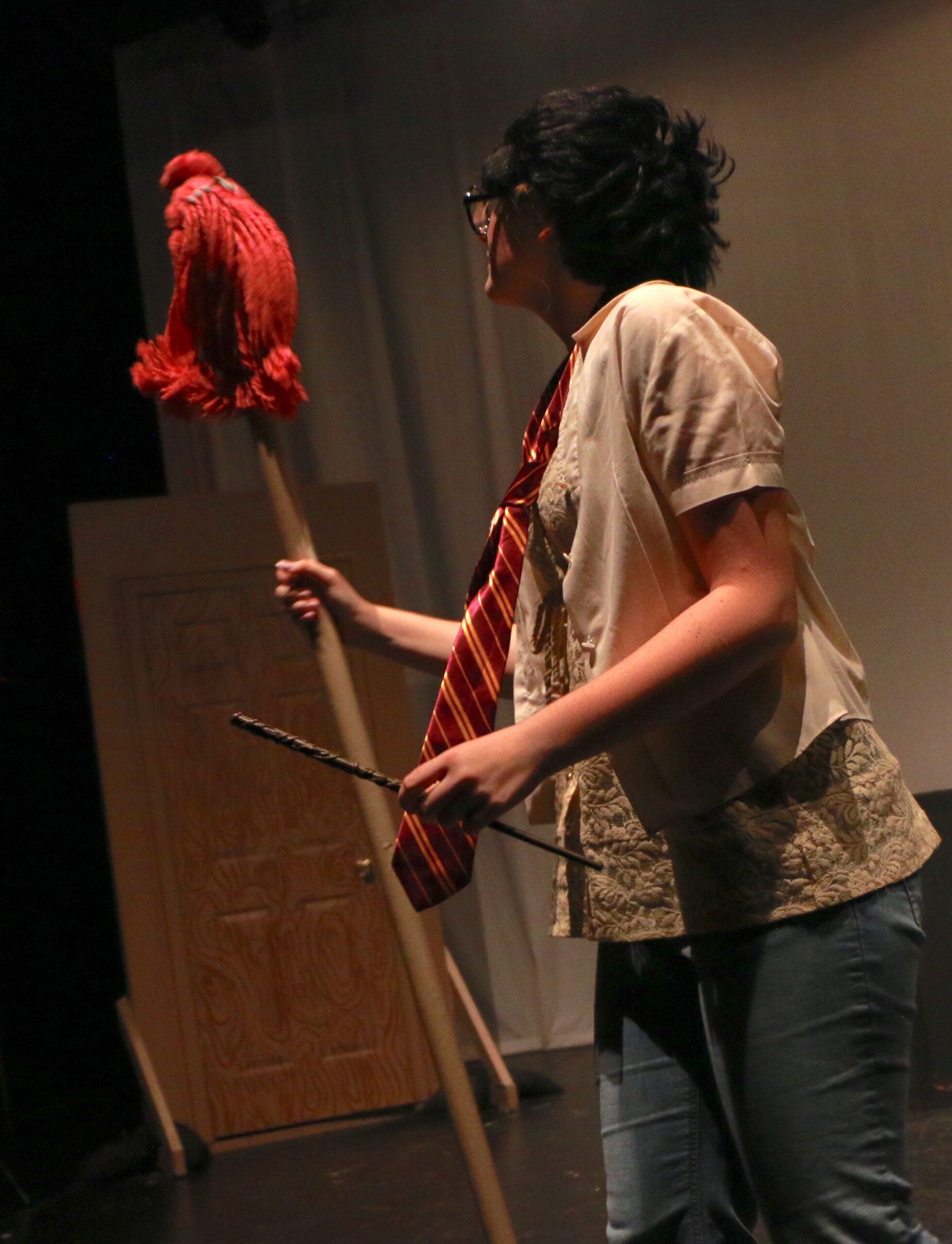 Student actor performing in Puffs
