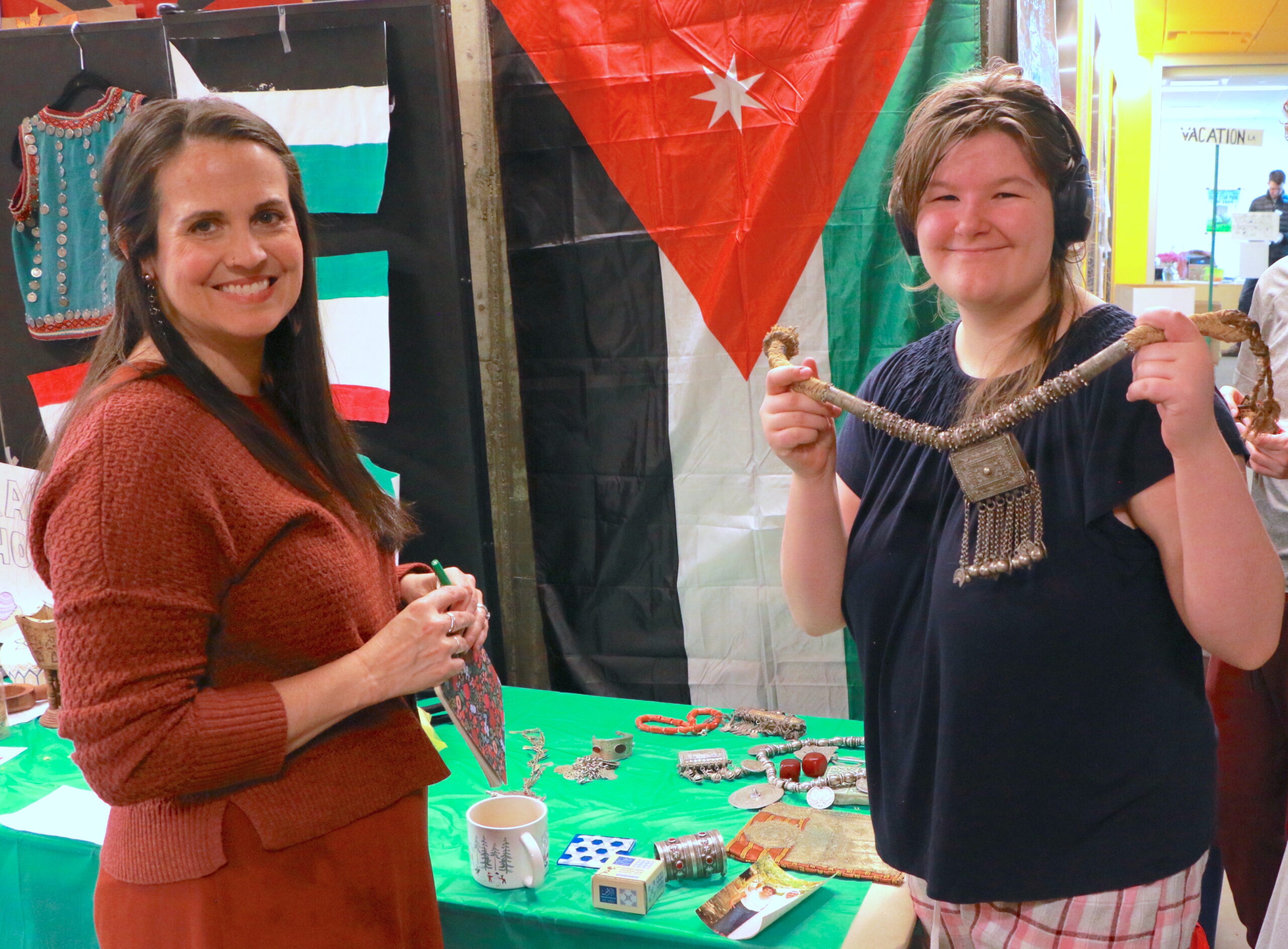 Student and a teacher participating in the Culture Fair