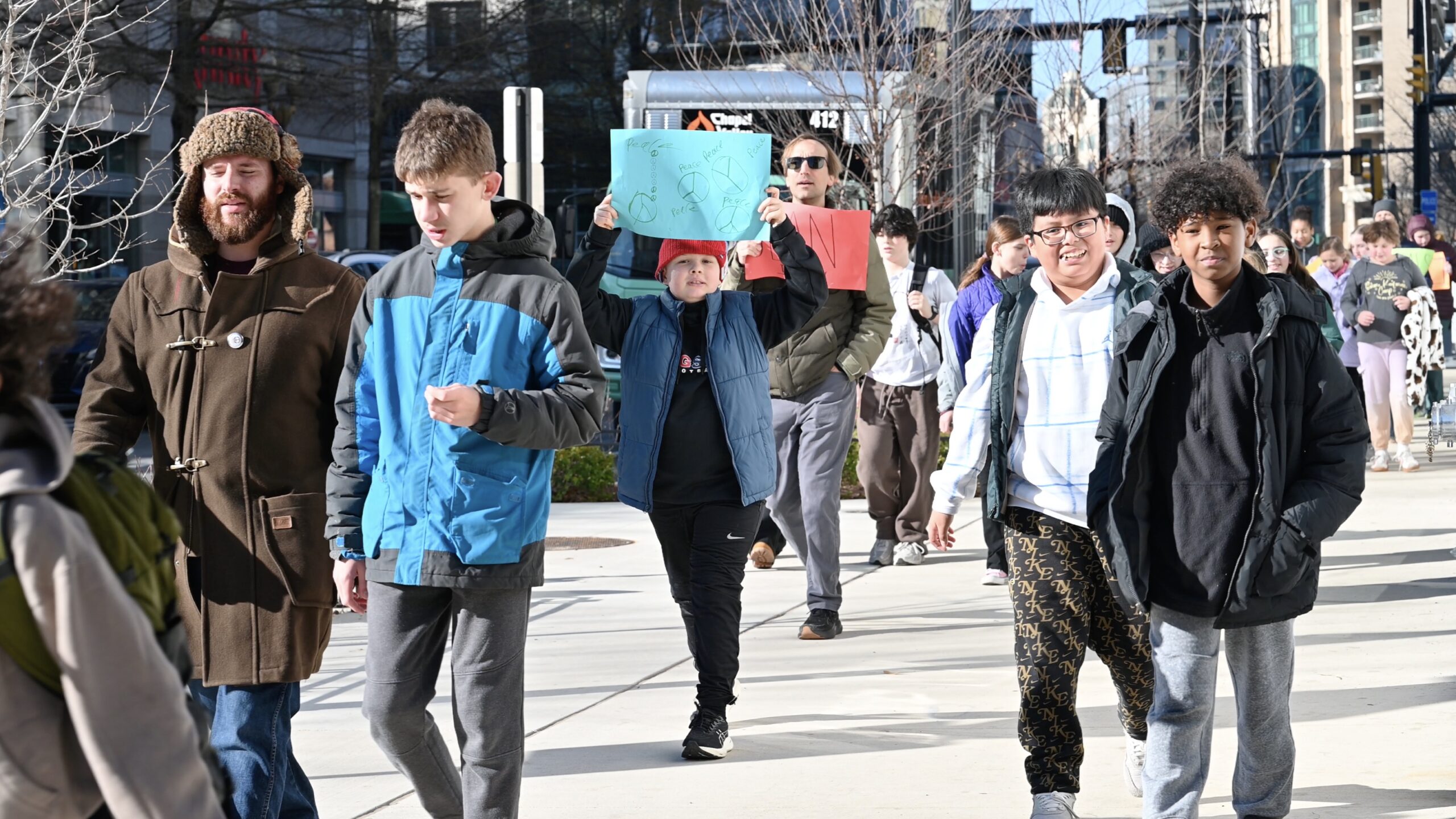 Students and teachers participating in the MLK Jr. Legacy Peace Walk